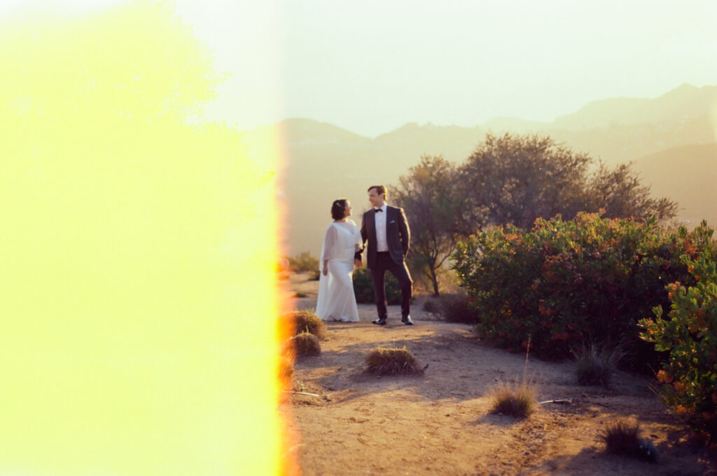 Light leak film photo of bride and groom in Topanga Canyon Malibu Destination Wedding