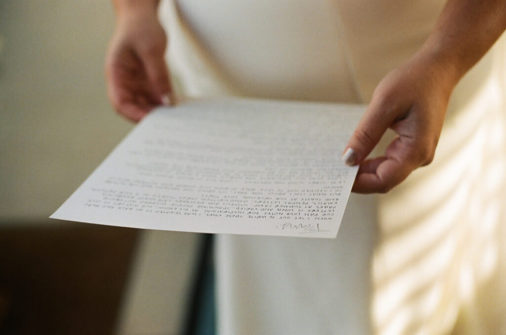 Bride's hands holding her vows. Topanga Canyon Malibu Destination Wedding