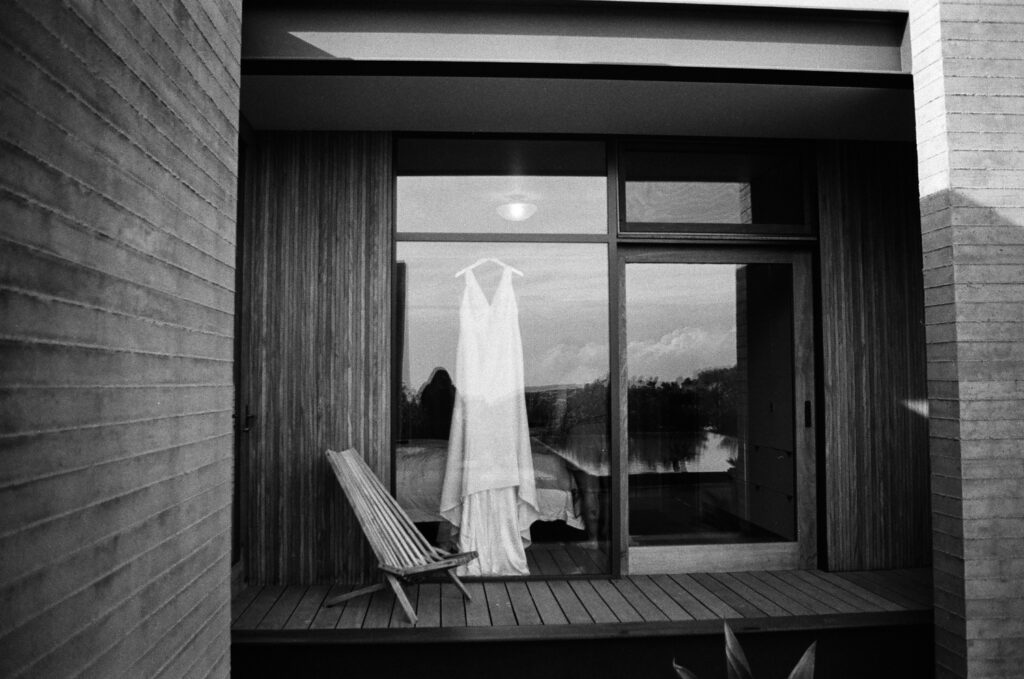 Bride's wedding dress hanging. Topanga Canyon Malibu Destination Wedding