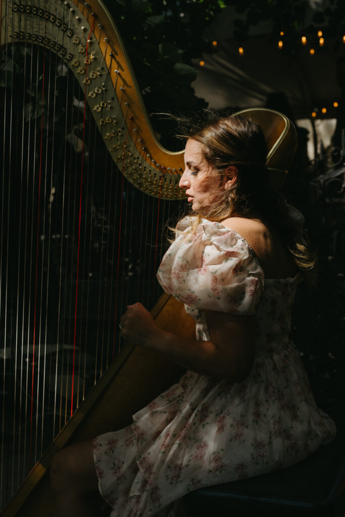 RVA Harpist playing the harp during a ceremony at Virginia House in Richmond Virginia
