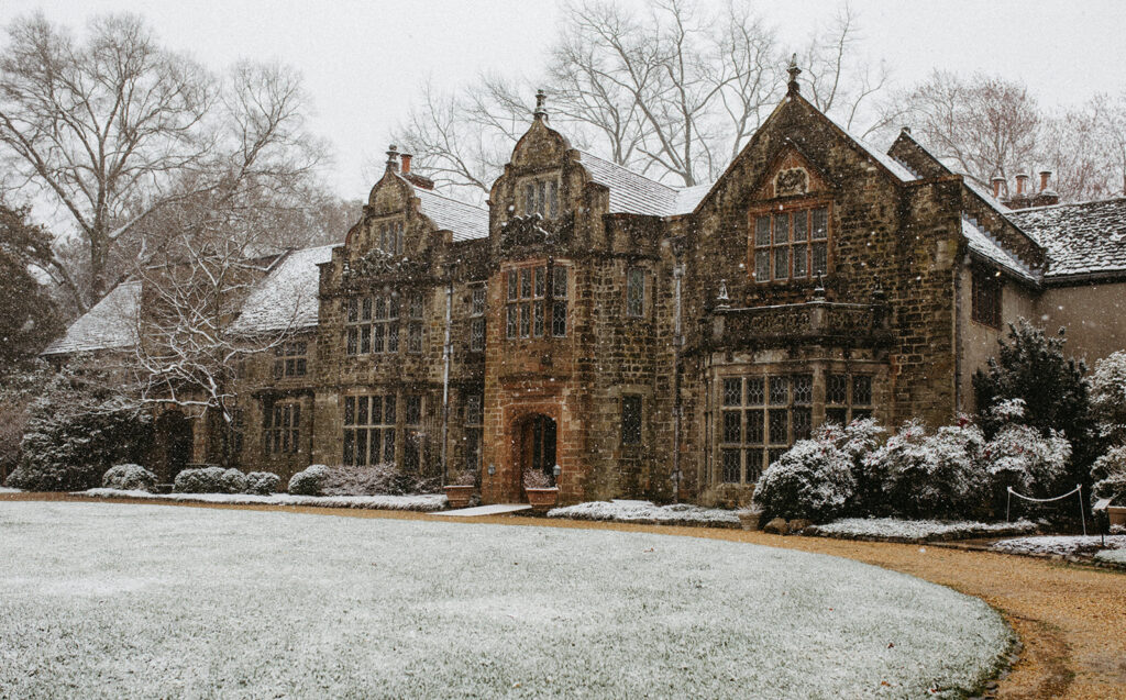 Exterior view of the historic Virginia House wedding venue in Richmond, Virginia, in the snow.