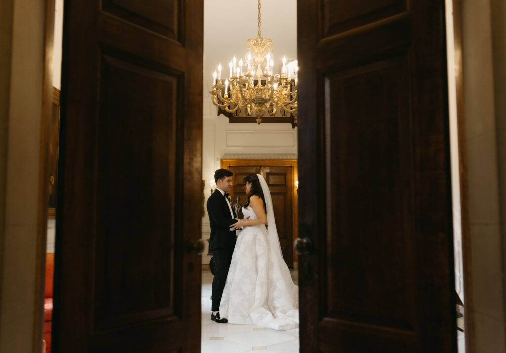 Fine art portrait of the couple in the marble courtyard at Larz Anderson House in Washington DC