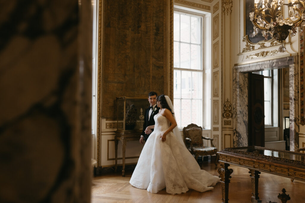 Fine art Portrait of bride and groom walking through the Larz Anderson House in Washington DC