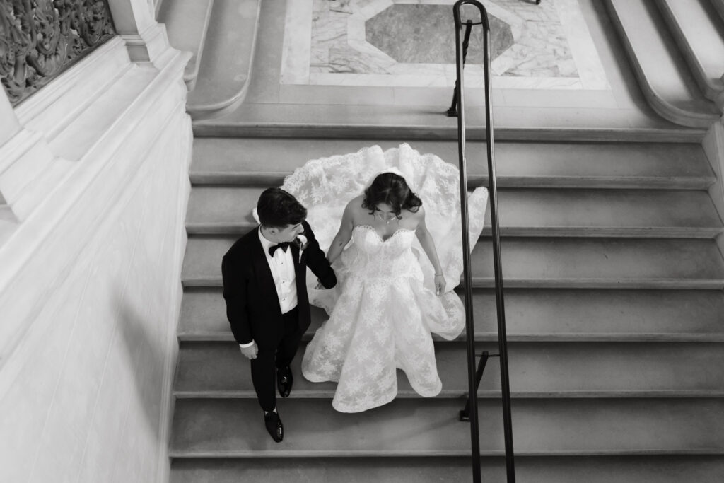 Fine art Portrait of bride and groom walking down the staircase at Larz Anderson House in Washington DC