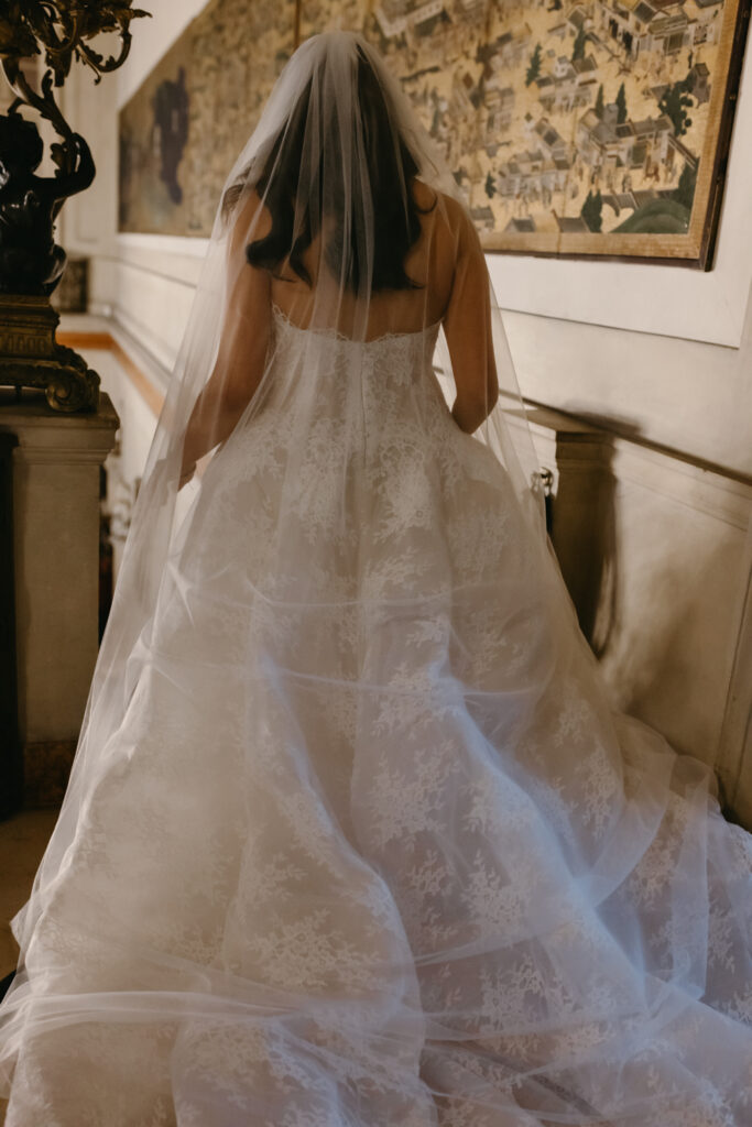 Bride entering the ceremony through the staircase in the Larz Anderson House in DC