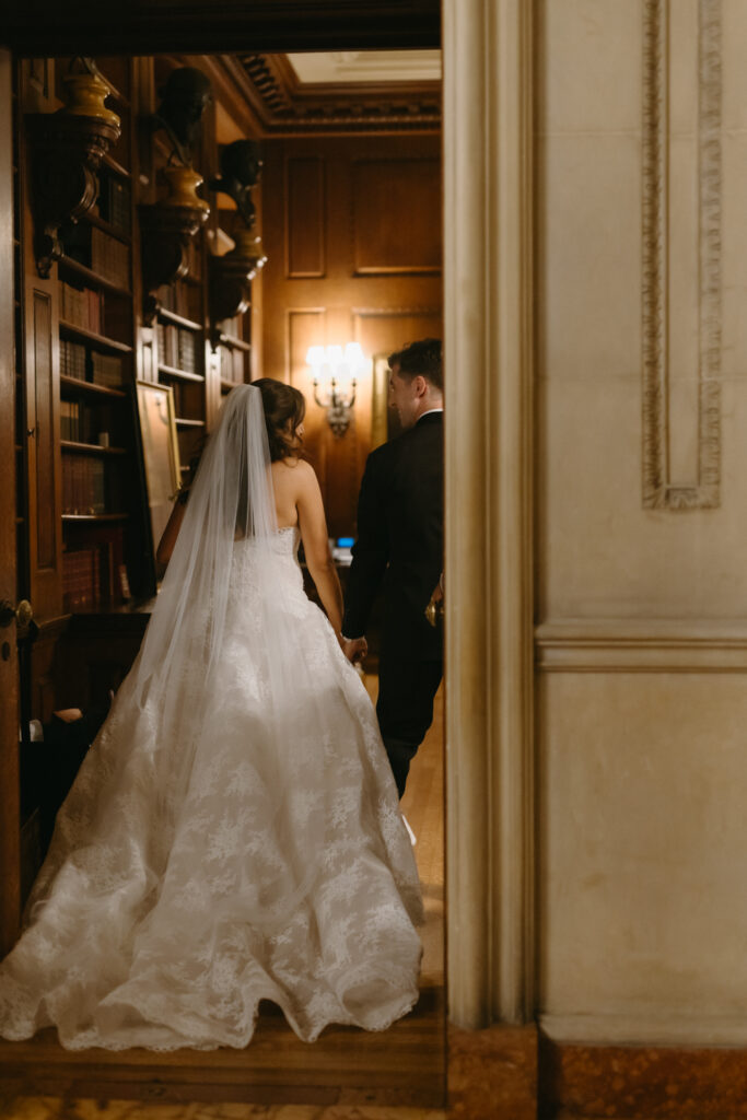 Bride and Groom a during their ceremony walking away at their formal Larz Anderson House DC Wedding