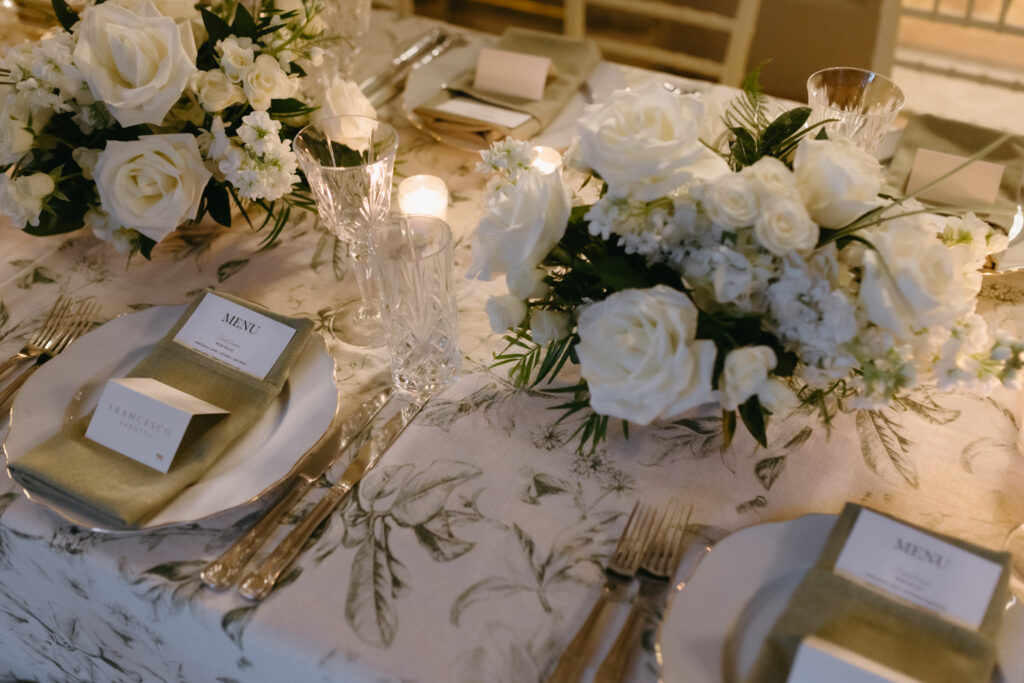 Evening portrait of the newlyweds outside the Larz Anderson House illuminated by soft lighting