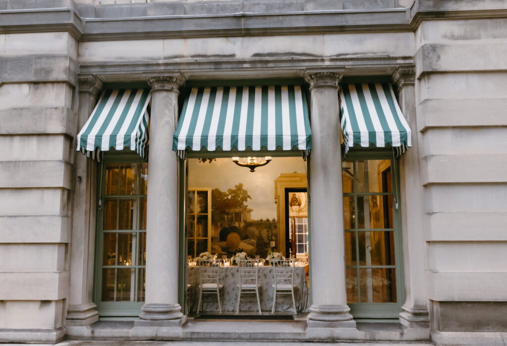 Black tie wedding reception tablescape inside the historic Larz Anderson House ballroom