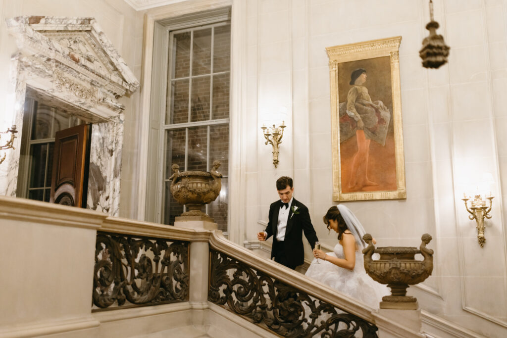 Evening portrait of the newlyweds entering their cocktail hour at the Larz Anderson House 