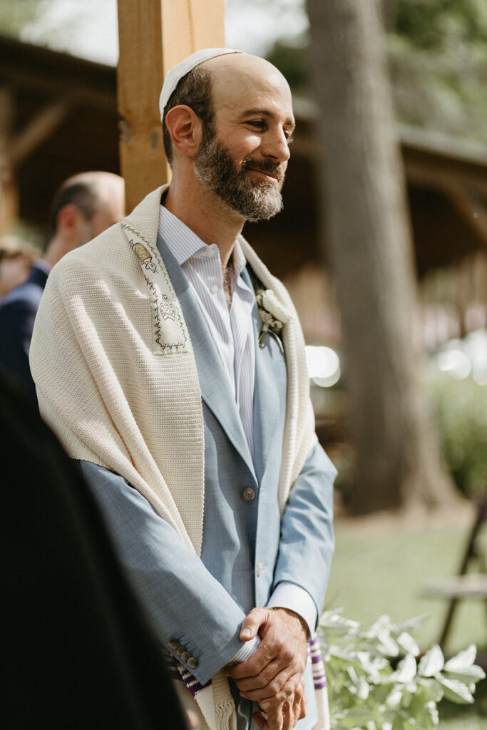 Abingdon Virginia summer wedding — Jewish wedding ceremony on the Creeper Trail, intimate moment between bride and groom surrounded by family.