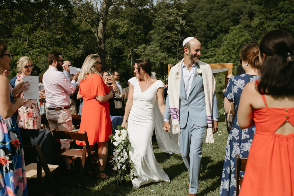 Abingdon Virginia summer wedding — Jewish wedding ceremony on the Creeper Trail, intimate moment between bride and groom surrounded by family.