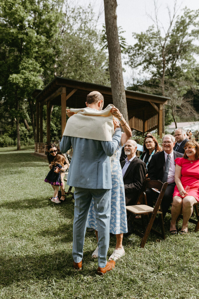 Abingdon Virginia summer wedding — Jewish wedding ceremony on the Creeper Trail, intimate moment between bride and groom surrounded by family.