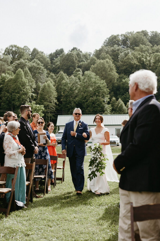 Abingdon Virginia summer wedding — Jewish wedding ceremony on the Creeper Trail, intimate moment between bride and groom surrounded by family.