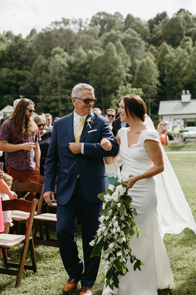 Abingdon Virginia summer wedding — Jewish wedding ceremony on the Creeper Trail, intimate moment between bride and groom surrounded by family.