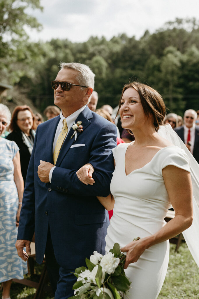Abingdon Virginia summer wedding — Jewish wedding ceremony on the Creeper Trail, intimate moment between bride and groom surrounded by family.