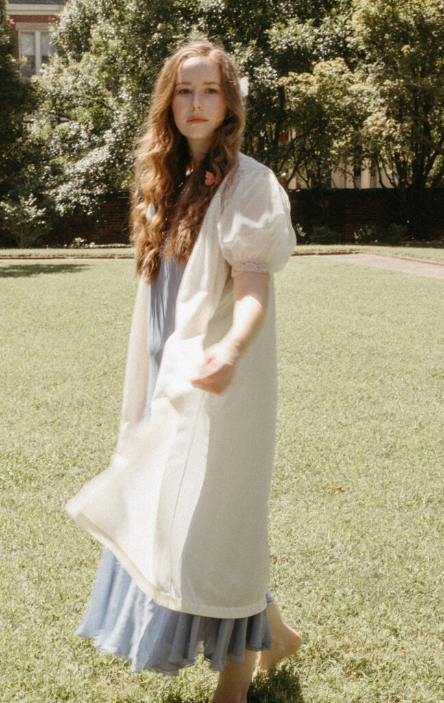 Portrait of woman in vintage dress and robe at the Branch Museum in Richmond, Virginia. 