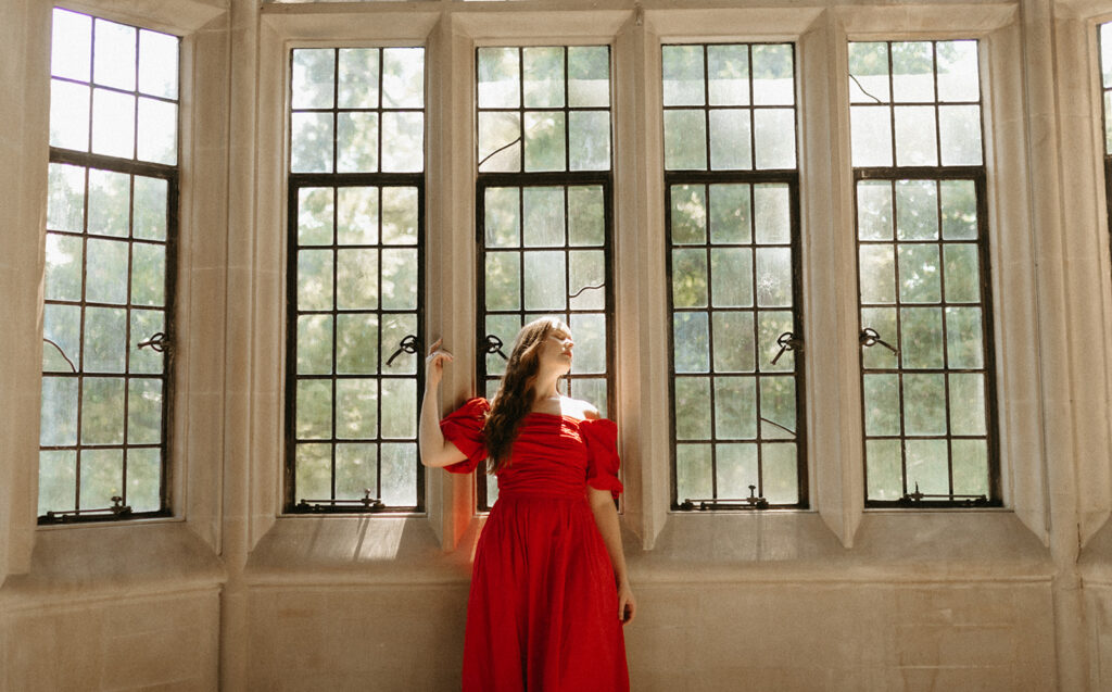 Portrait of woman in red dress at the Branch Museum in Richmond, Virginia. 