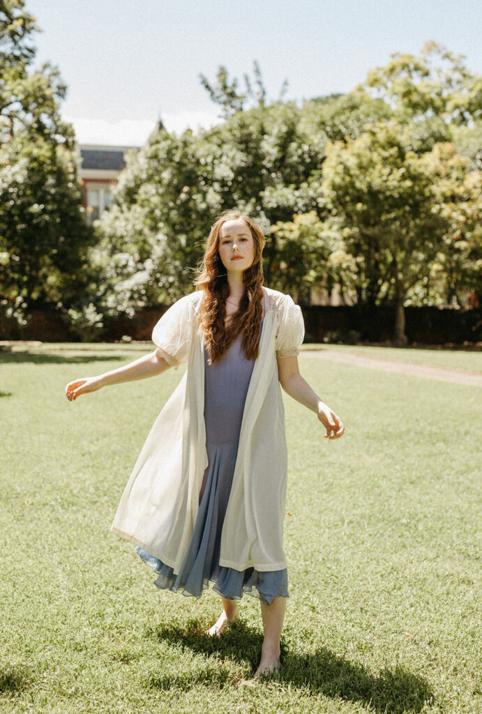Portrait of woman in vintage dress and robe at the Branch Museum in Richmond, Virginia. 