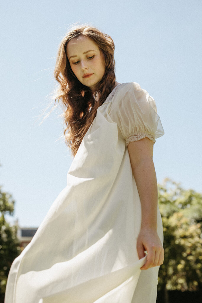 Portrait of woman in vintage dress and robe at the Branch Museum in Richmond, Virginia. 