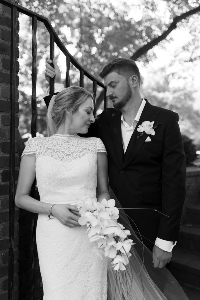Bride and groom portrait in front of gate at Richmond venue