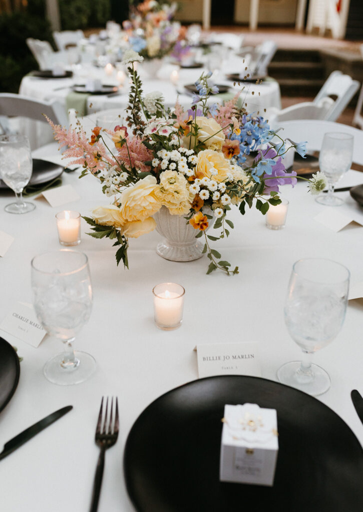 Floral arrangement on table at wedding reception at the Linden Row.