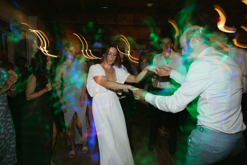 Abingdon Virginia summer wedding — lively reception with a disco dance floor at Summers Roof and Cellar, filled with laughter and dancing.