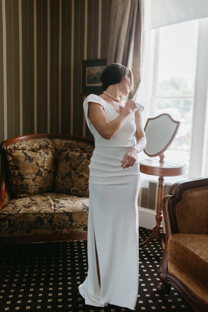Abingdon Virginia summer wedding — intimate portrait of bride in her dress at the Martha Washington Inn, capturing joyful and relaxed moments.