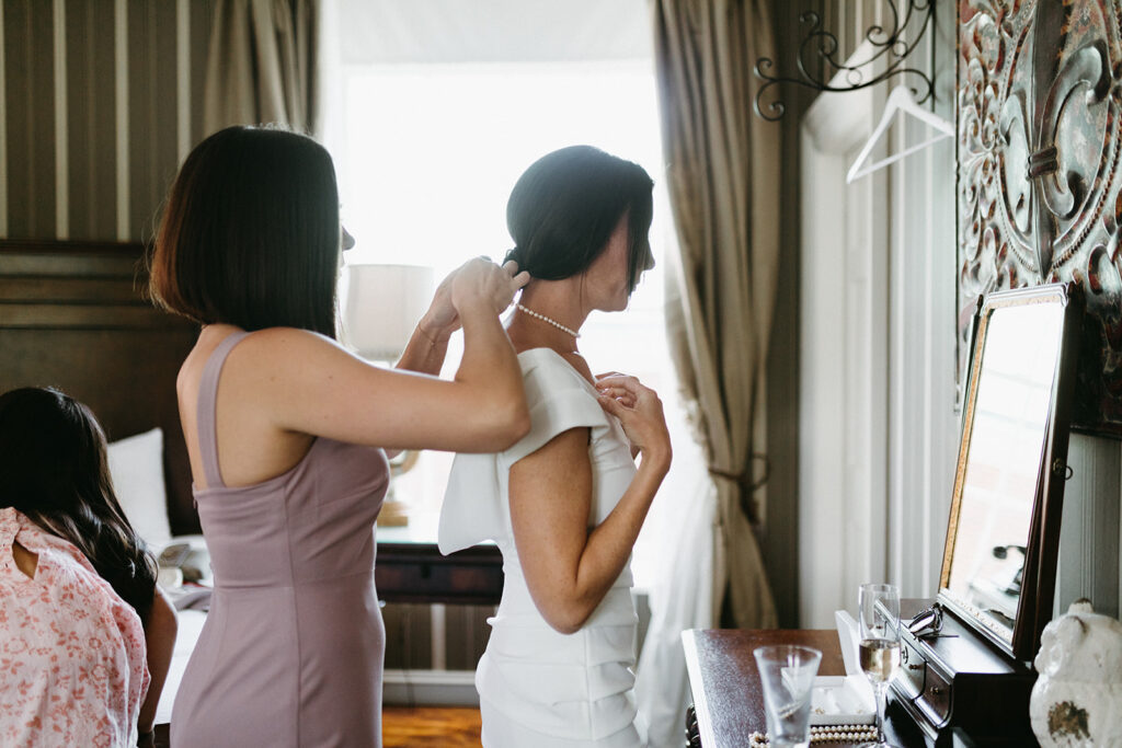 Abingdon Virginia summer wedding — morning preparations at the Martha Washington Inn, bride surrounded by family and friends before the ceremony.